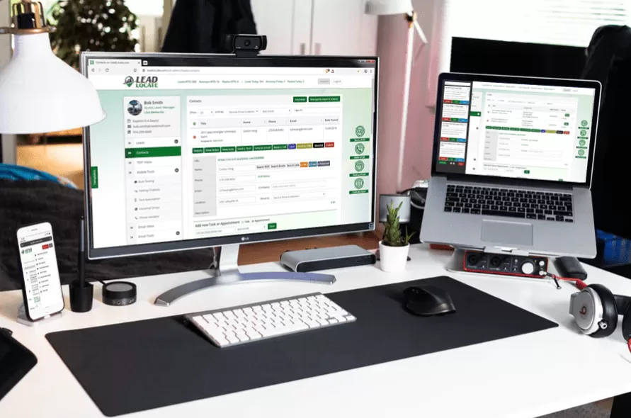 Car salesperson desk running LeadLocate CRM