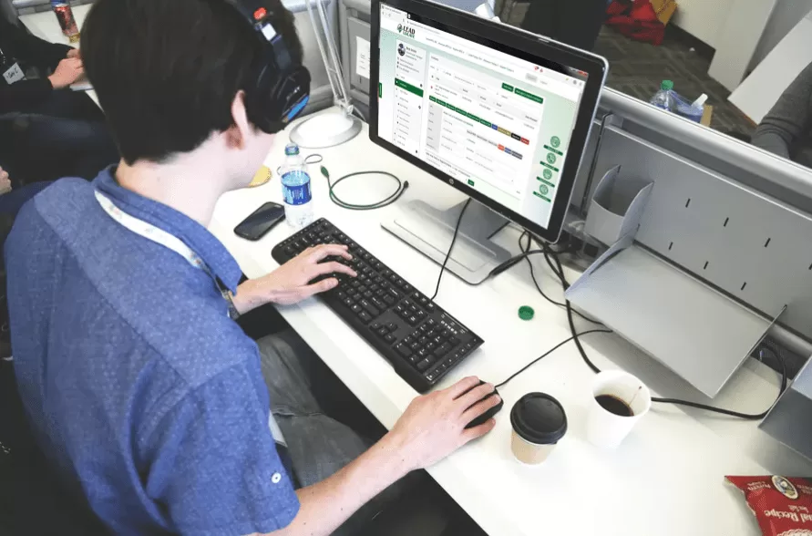Car salesperson working leads in LeadLocate CRM